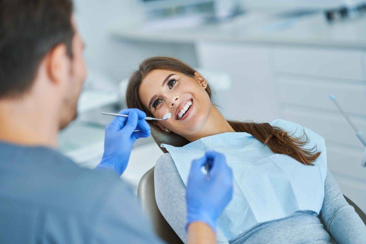 Child receiving an orthodontic evaluation for jaw growth and bite development
