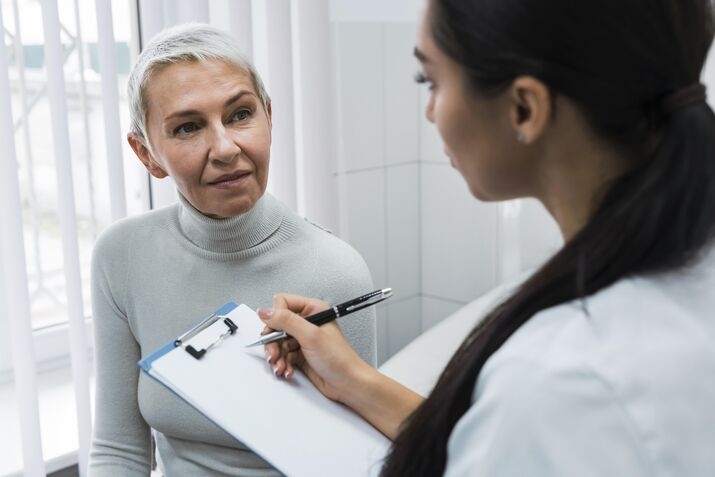 Dentist performing a patient examination